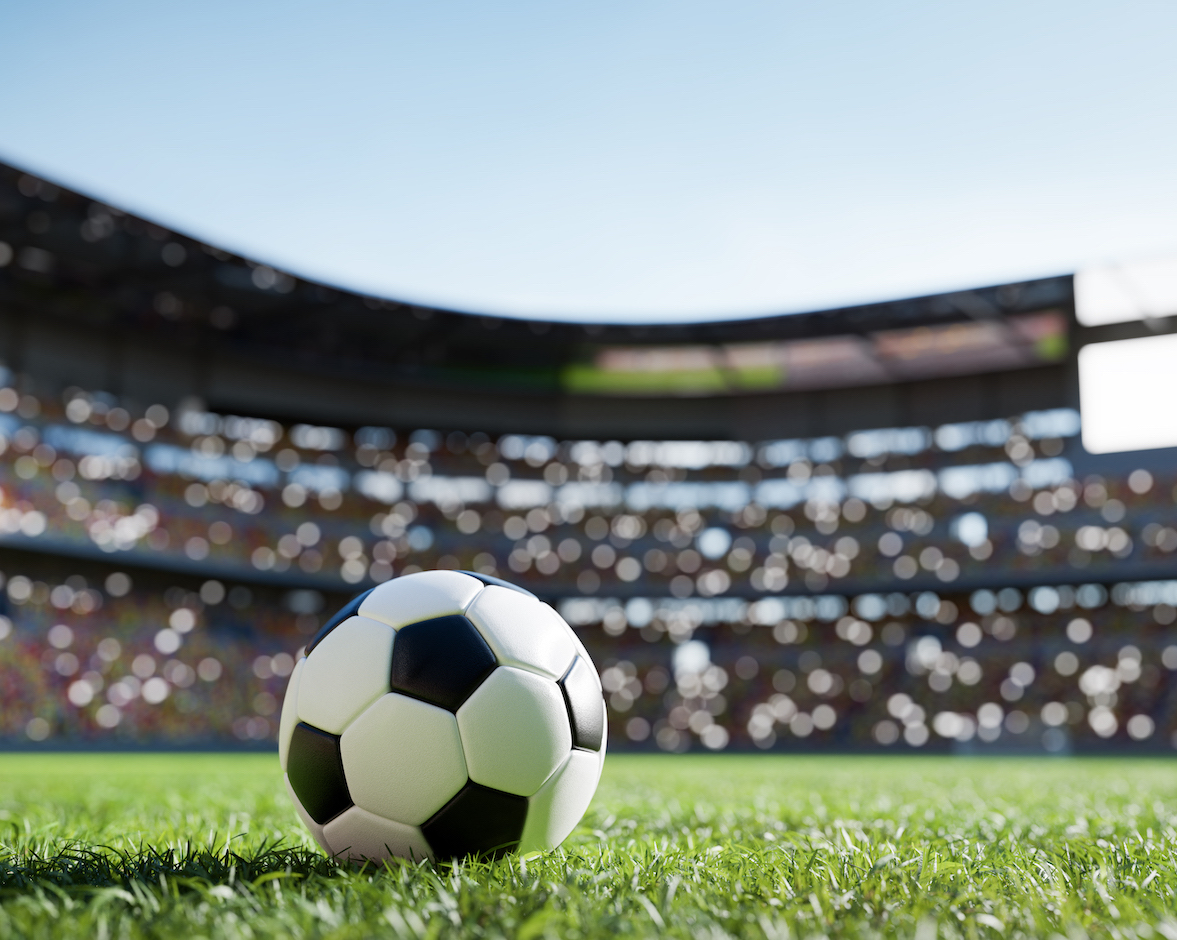 Football soccer ball on grass field on stadium. Sport